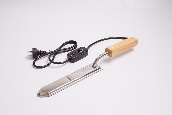 Electric uncapping knife